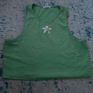 Full Tilt green wife enter tank top with flower on front. Size large and medium.